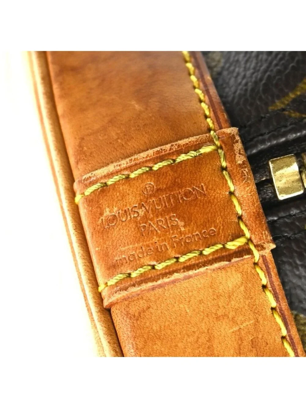 Louis Vuitton Alma Monogram Leather Handbag